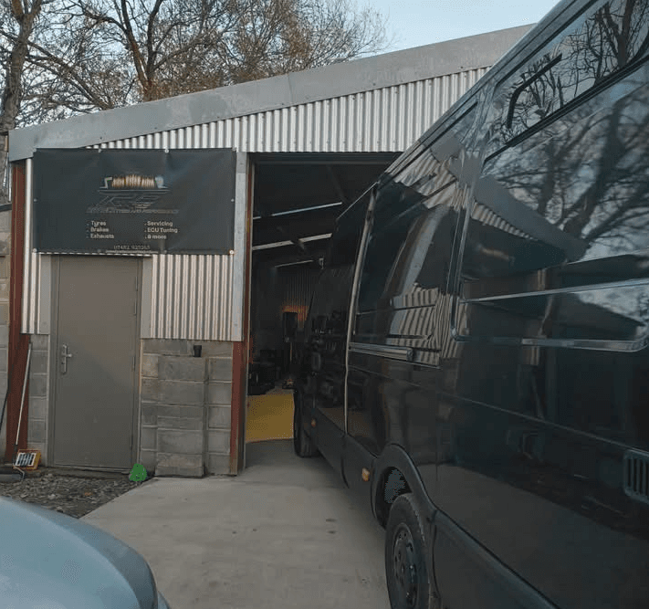 Mechanic working on a car
